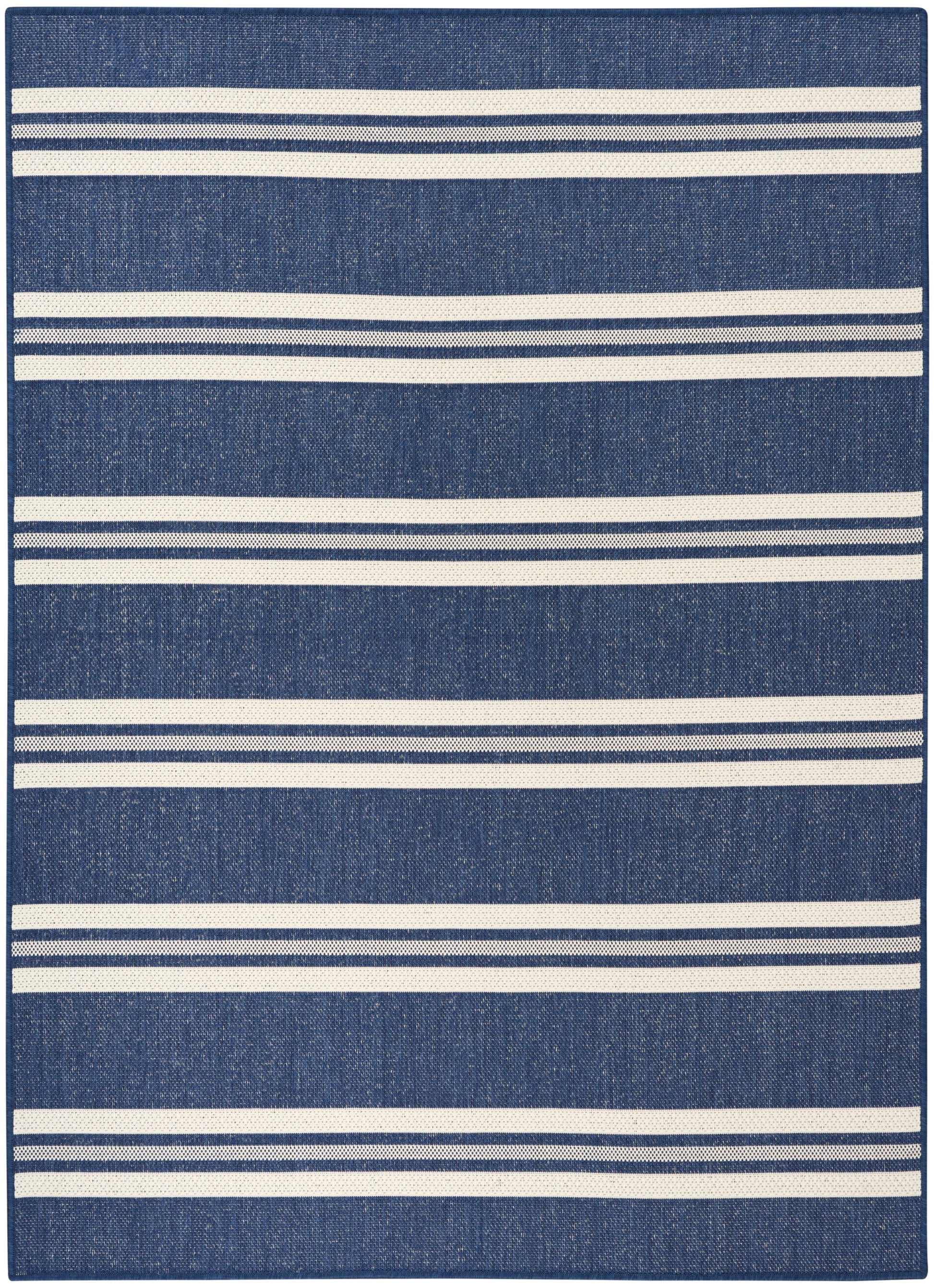Blue denim rug featuring alternating white horizontal stripes of varying thickness.