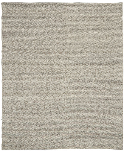 Beige textured loop-pile rug with soft neutral tones; rectangular, cozy living-room accent.