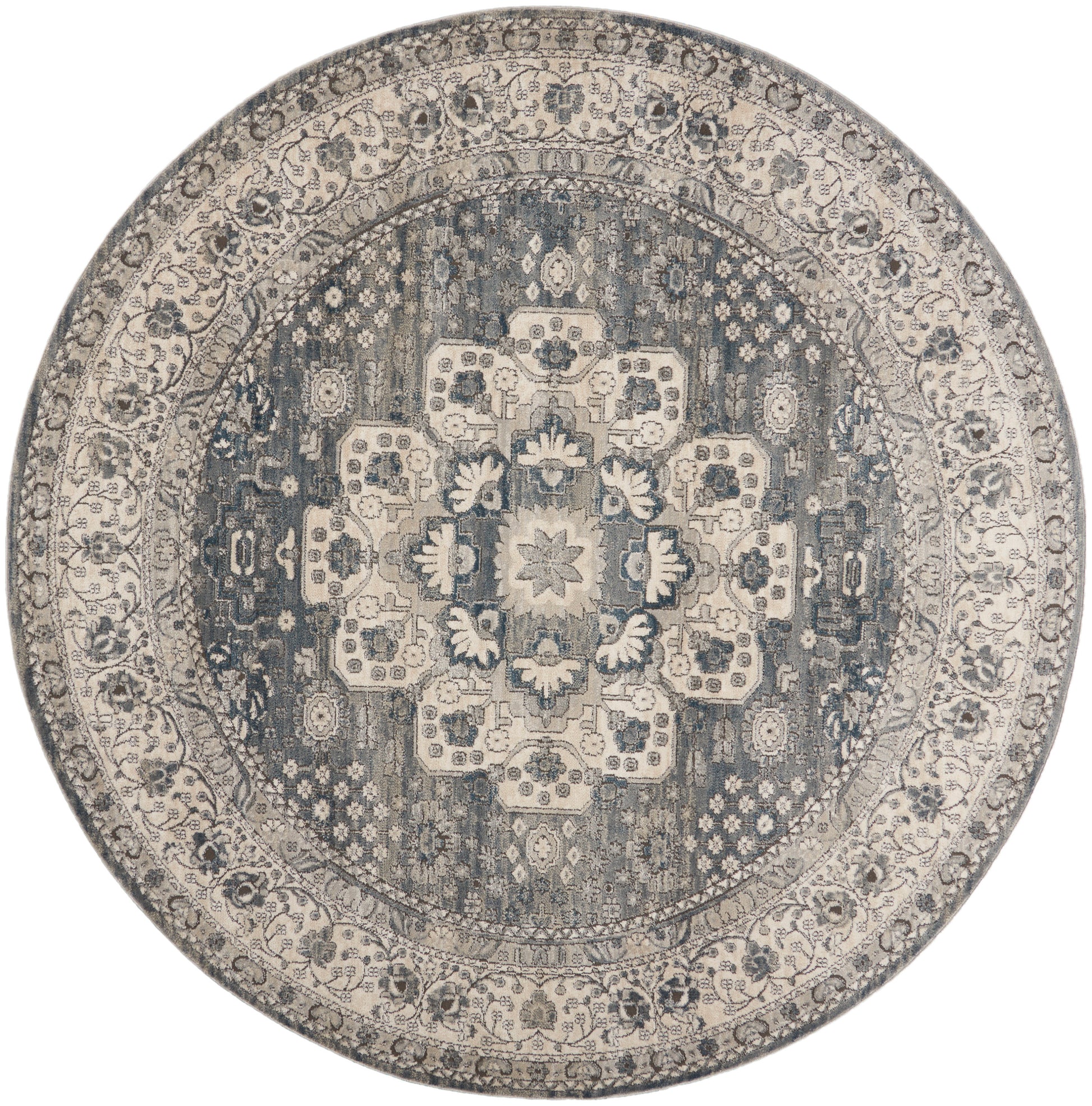 Round oriental rug in navy and ivory with floral medallion and ornate border.