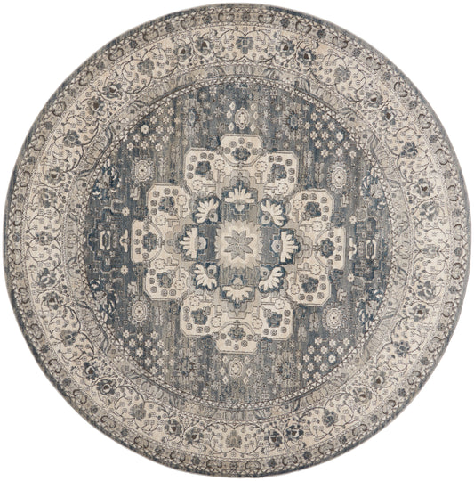 Round oriental rug in navy and ivory with floral medallion and ornate border.