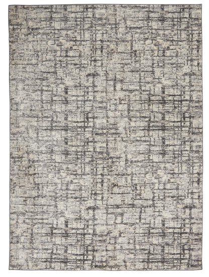 Rectangular beige-gray distressed rug with abstract grid pattern, soft woven texture, modern rustic style.