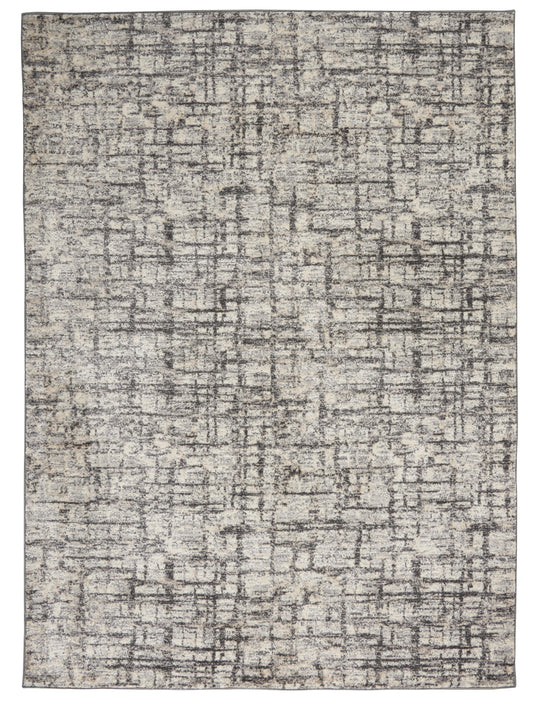 Rectangular beige-gray distressed rug with abstract grid pattern, soft woven texture, modern rustic style.