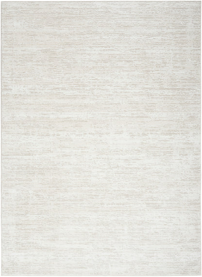 Light beige textured area rug with subtle heathered weave; neutral, versatile for living room or bedroom.