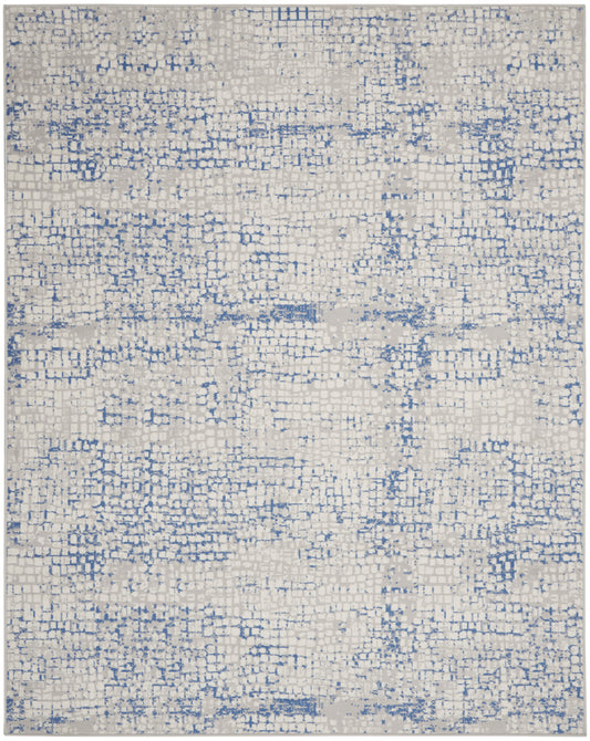 Cream & blue abstract patterned area rug with a distressed look, modern decorative floor covering.
