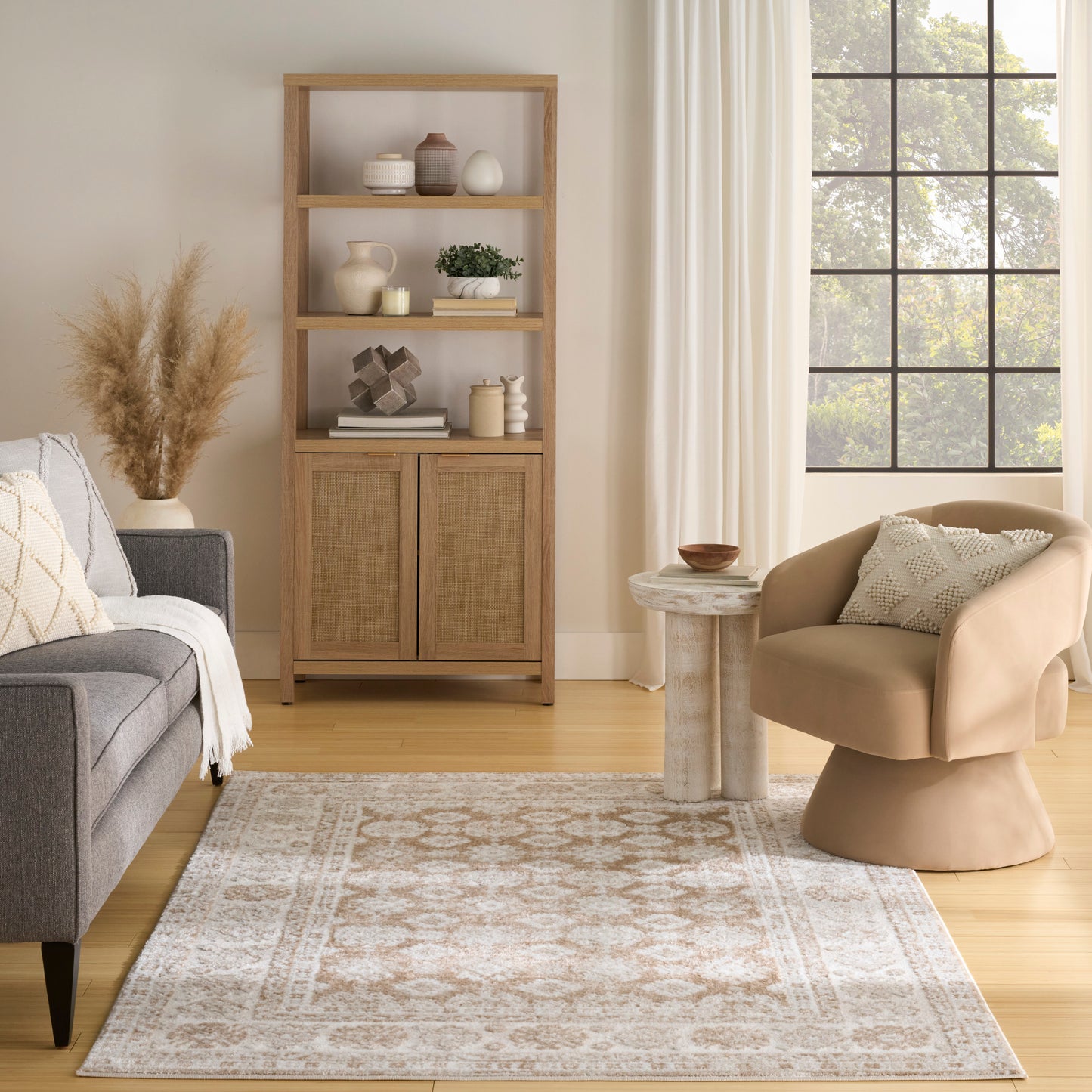 Vintage 5' x 7' rug in neutral tones in a modern living room.
