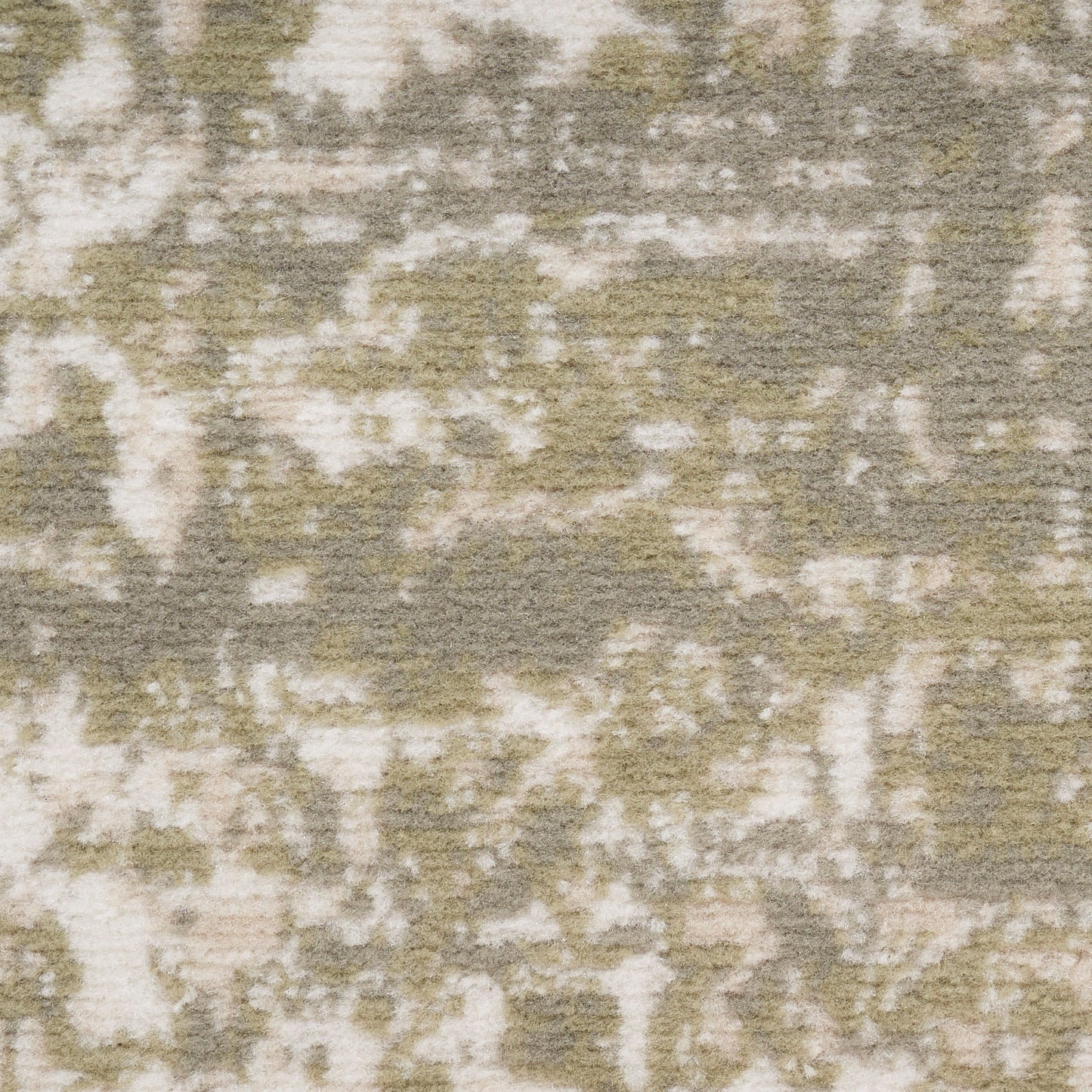Close-up of a beige cream abstract patterned rug with olive-green undertones and plush texture.