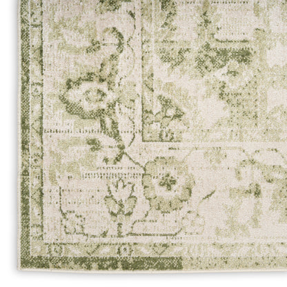 Beige and sage green oriental-style rug with floral motifs and ornate border