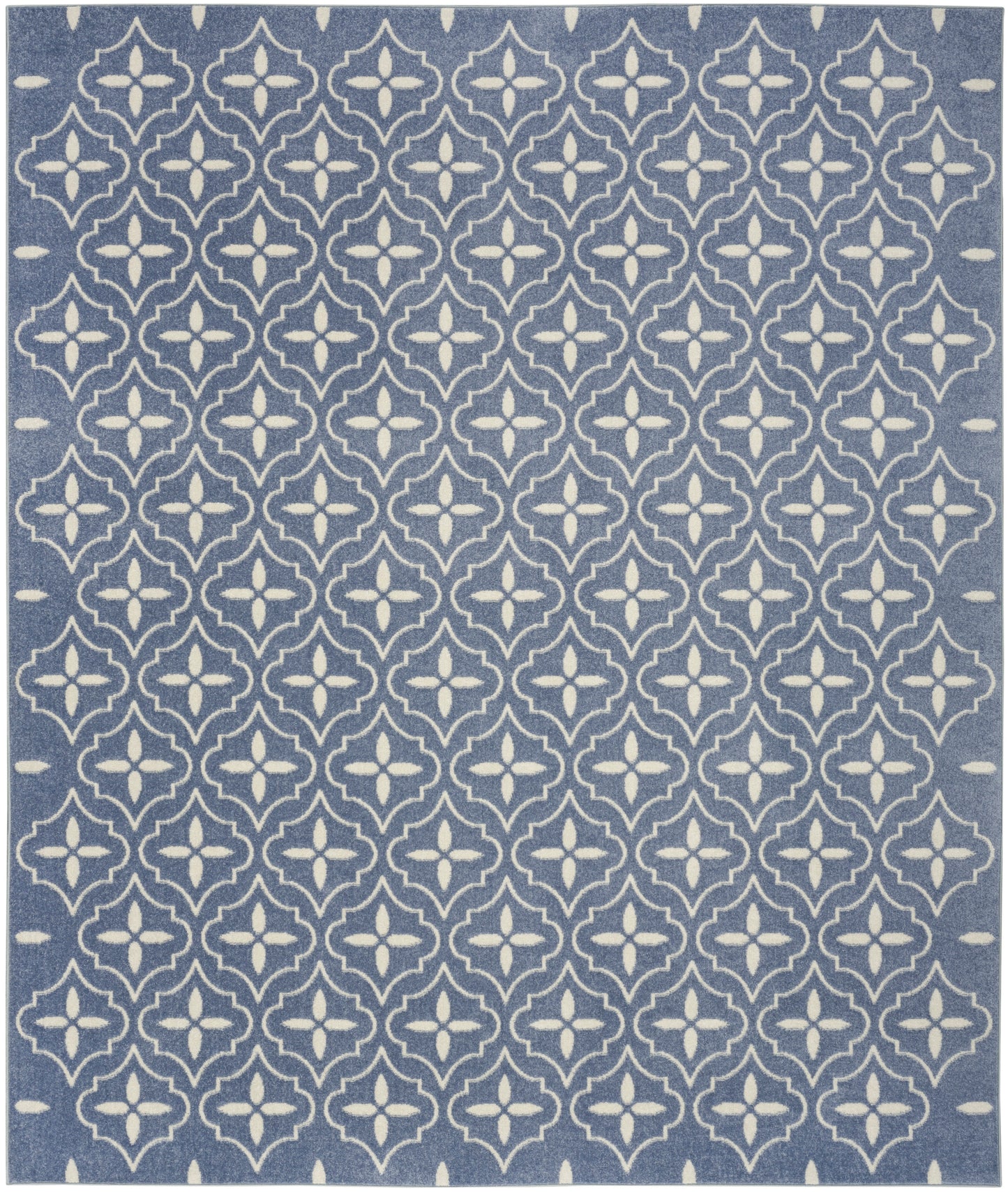 Blue area rug with white geometric lattice quatrefoil pattern; rectangular, woven textile.