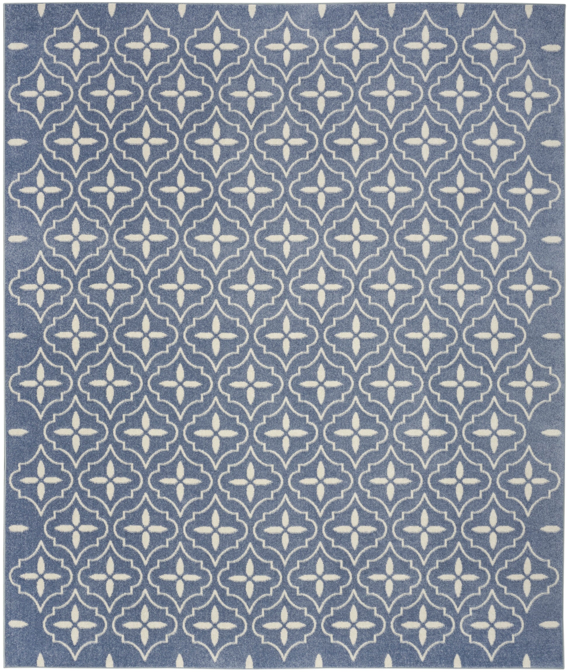Blue area rug with white geometric lattice quatrefoil pattern; rectangular, woven textile.