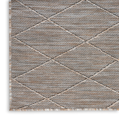 Rectangular natural tan and gray woven rug with diamond lattice pattern, textured surface and fringe trim.