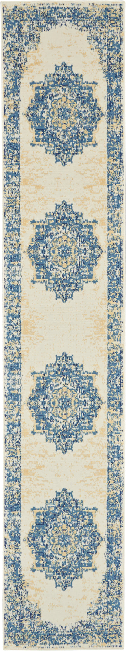 Persian-inspired runner rug in cream with four navy-blue medallions and a distressed blue border.