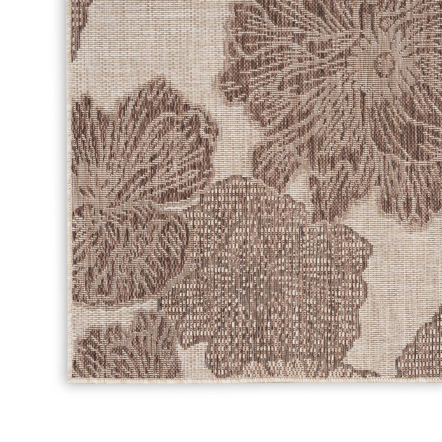 Beige jacquard rug with brown large floral motif, woven textured close-up, 3' x 5'.