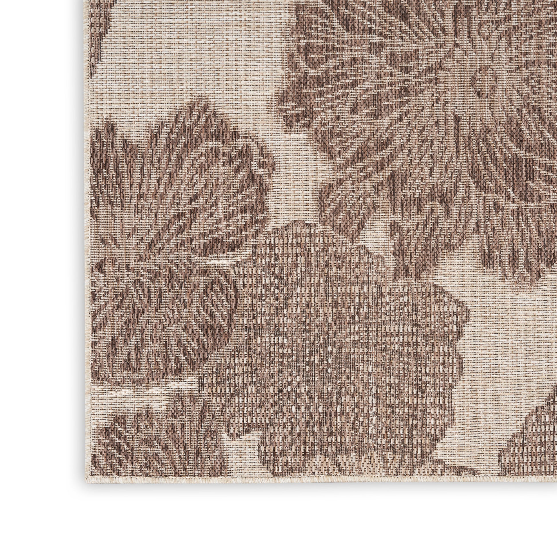 Beige jacquard rug with brown large floral motif, woven textured close-up, 3' x 5'.