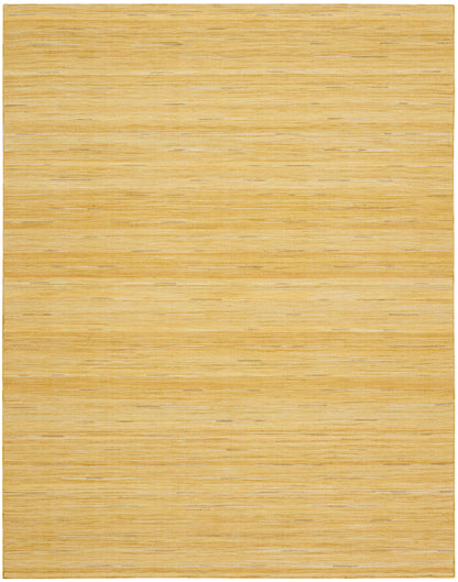 Light golden rug with subtle woven texture and a contemporary look.