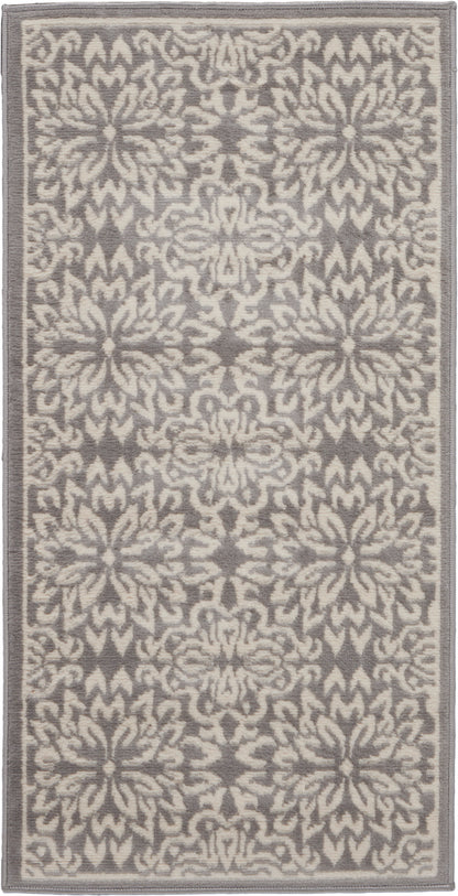 Gray & beige patterned rug with floral medallions and a narrow border.