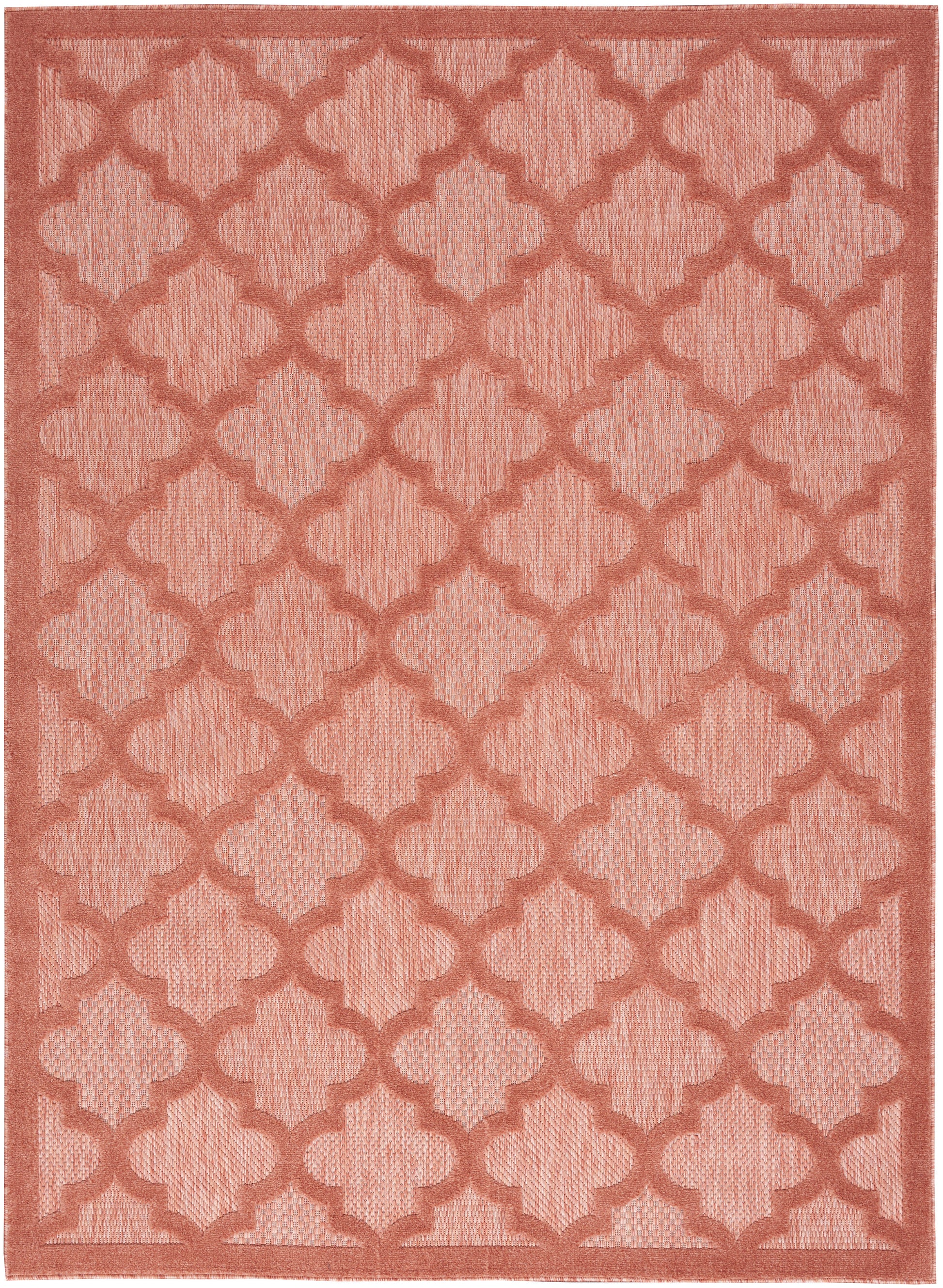 Coral rug with repeating trellis quatrefoil pattern and woven texture; rectangular with border.