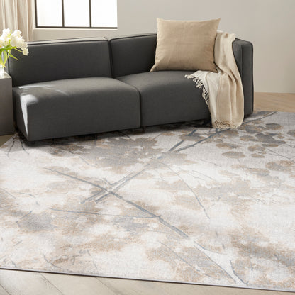 Cream-beige abstract area rug, 8' x 10', laid in a modern living room.