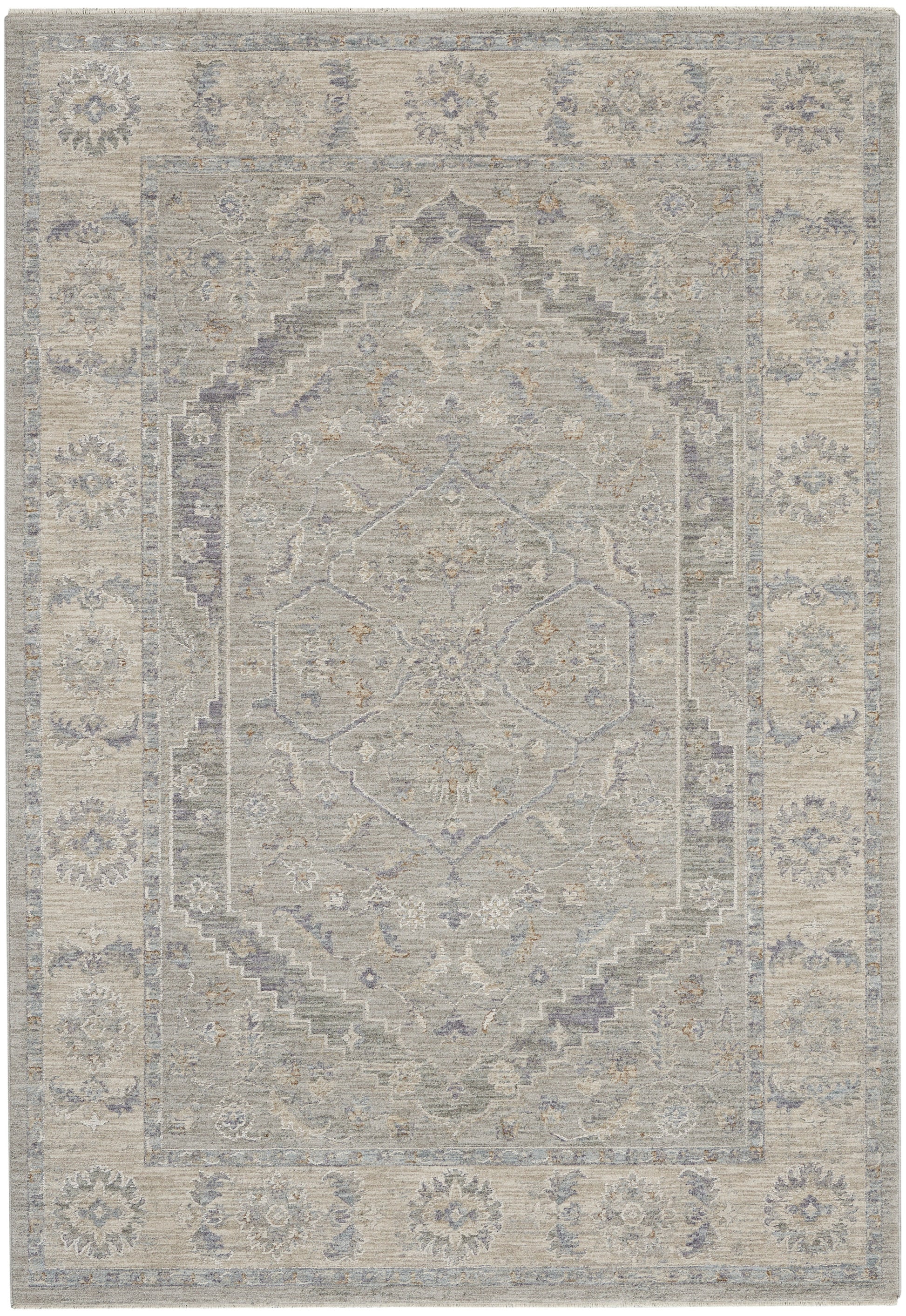 Muted gray-blue oriental rug featuring a central geometric medallion, layered borders, and subtle floral motifs.