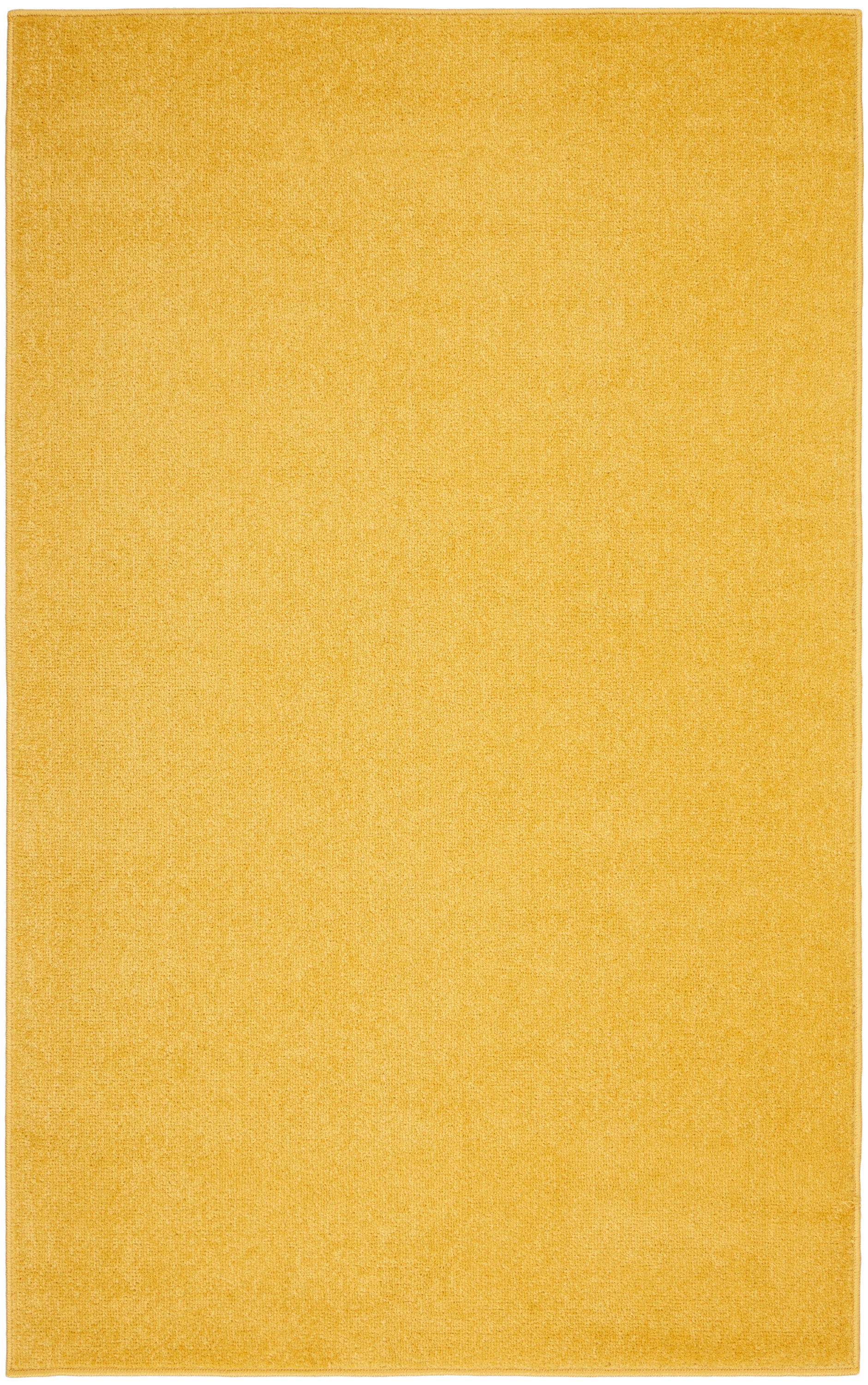 Mustard yellow rectangular outdoor rug with a subtle textured weave for a soft, modern outdoor space.