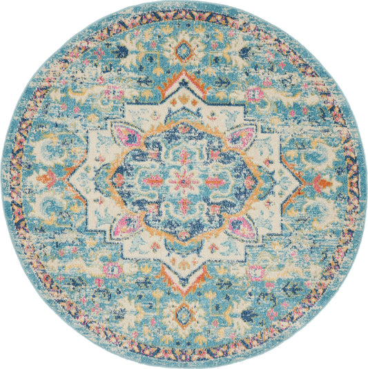 Round turquoise oriental rug with cream central medallion, blue accents and pink-orange floral details.