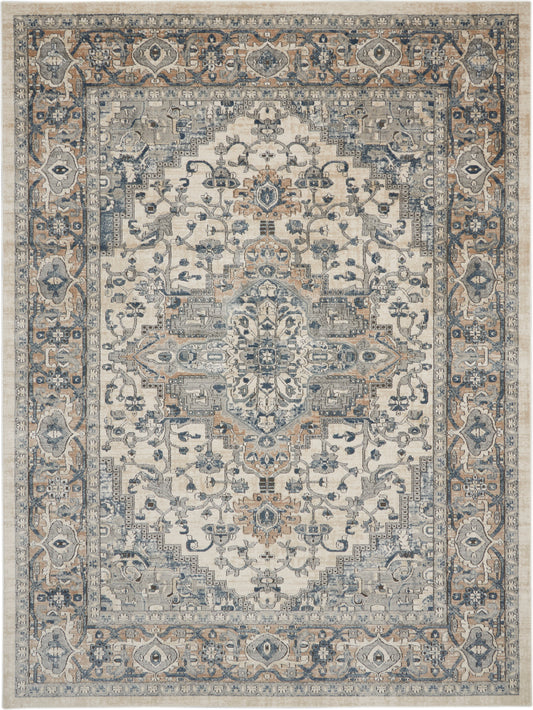 Traditional Persian-style area rug in ivory, blue, and beige with a central medallion and ornate floral border.