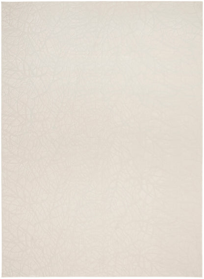 Cream beige rug with soft texture and subtle color variation, 8' x 10'.