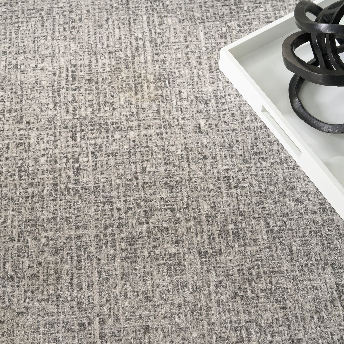 Gray textured rug.