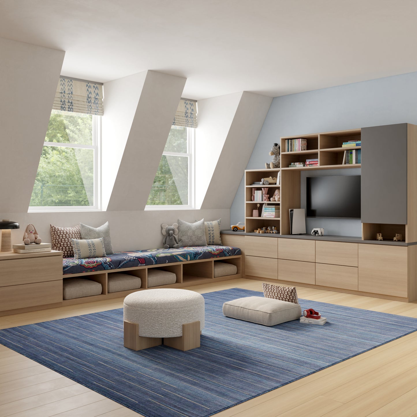 Living room with light wood storage unit, blue rug, angled windows, modular seating with cushions, TV cabinet.