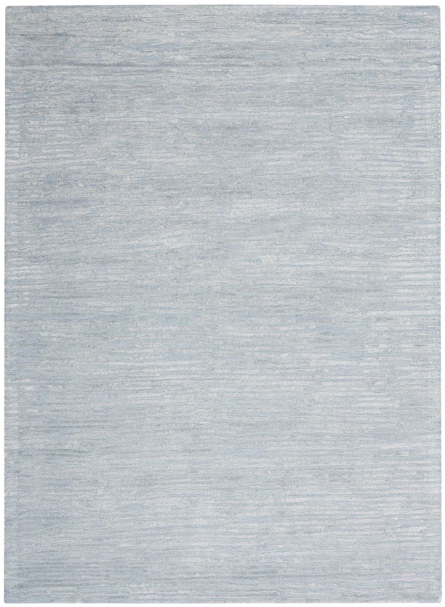 Light blue-gray rug with subtle tonal texture; rectangular decorative rug.
