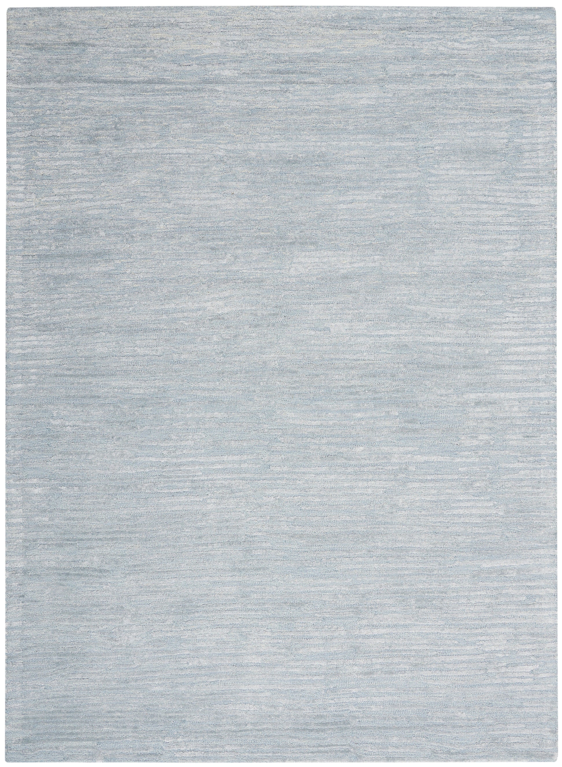 Light blue-gray rug with subtle tonal texture; rectangular decorative rug.