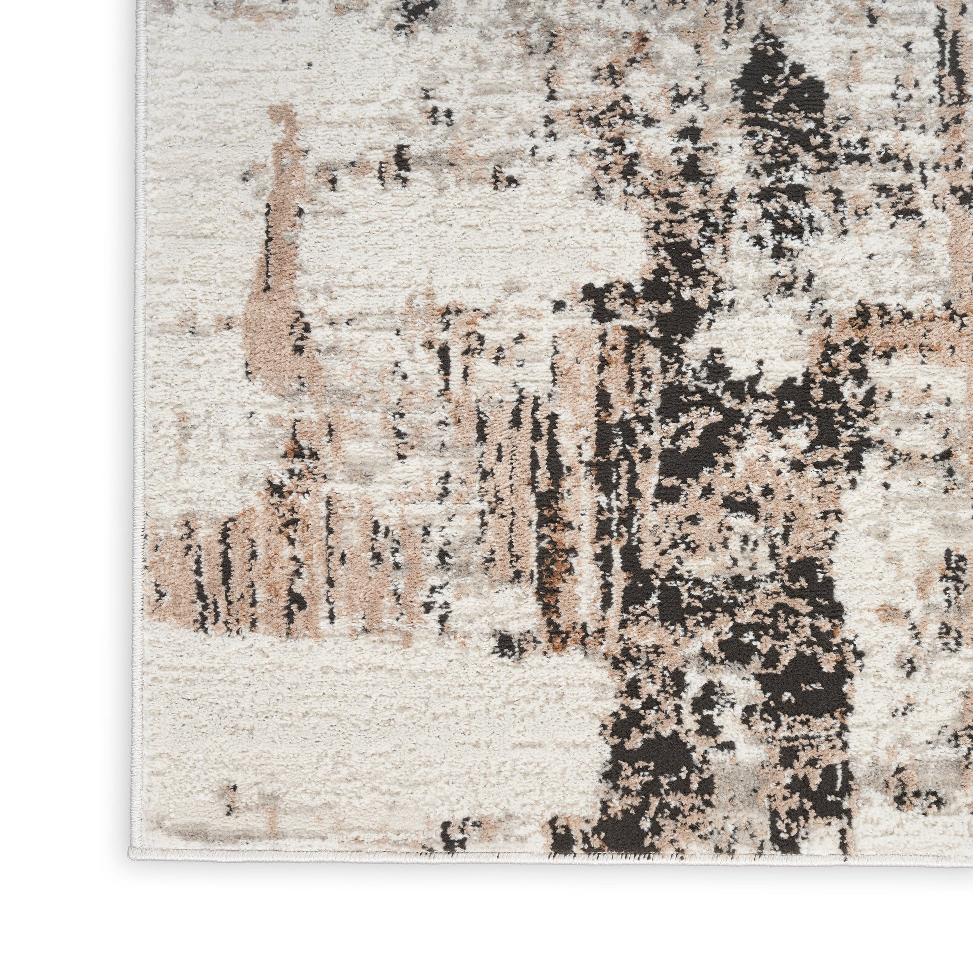Rectangular abstract-pattern rug with cream, beige, tan and black hues; plush pile, modern rustic decor.