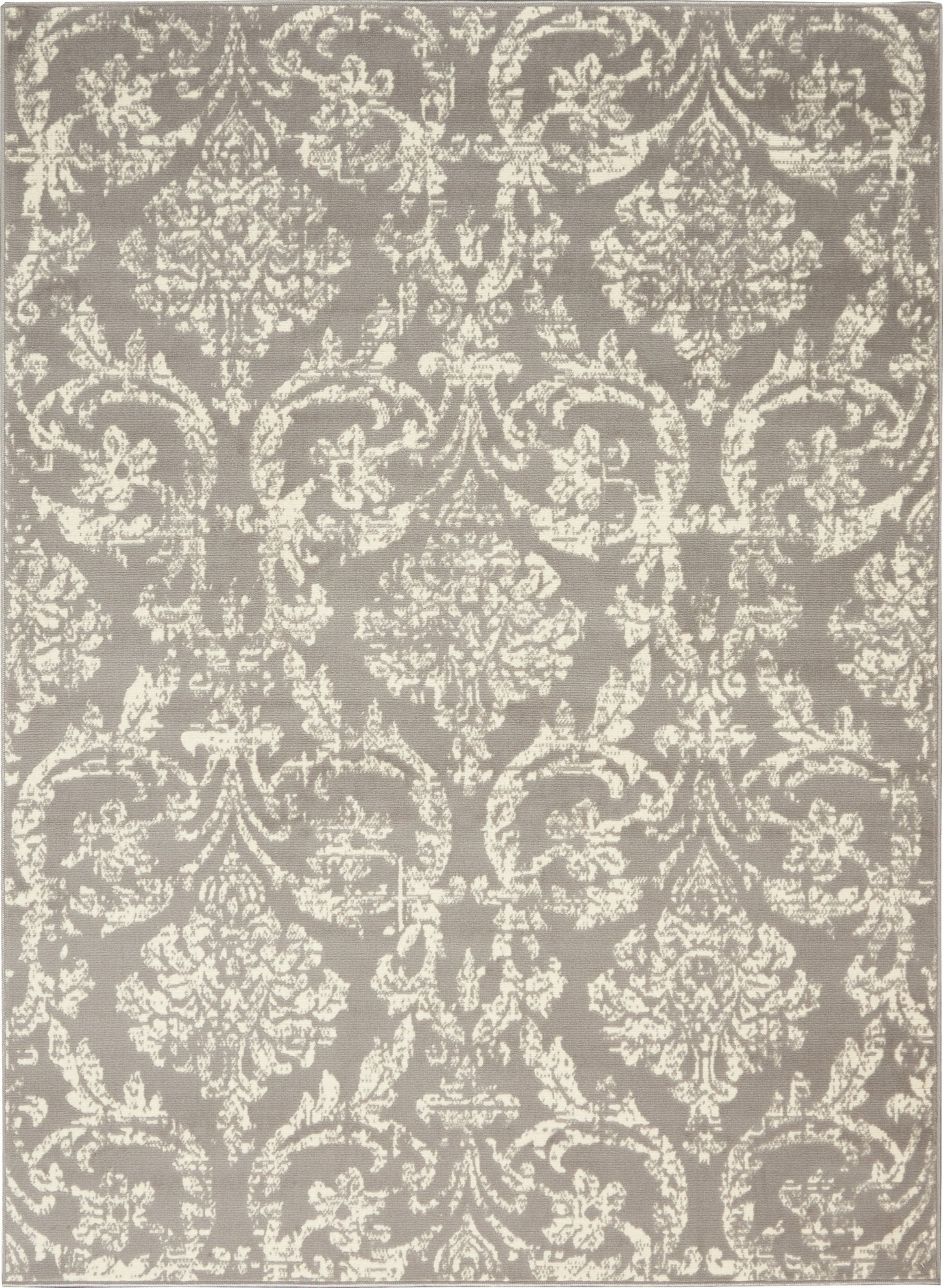 Taupe rug with ivory damask pattern and ornate floral scroll motifs.