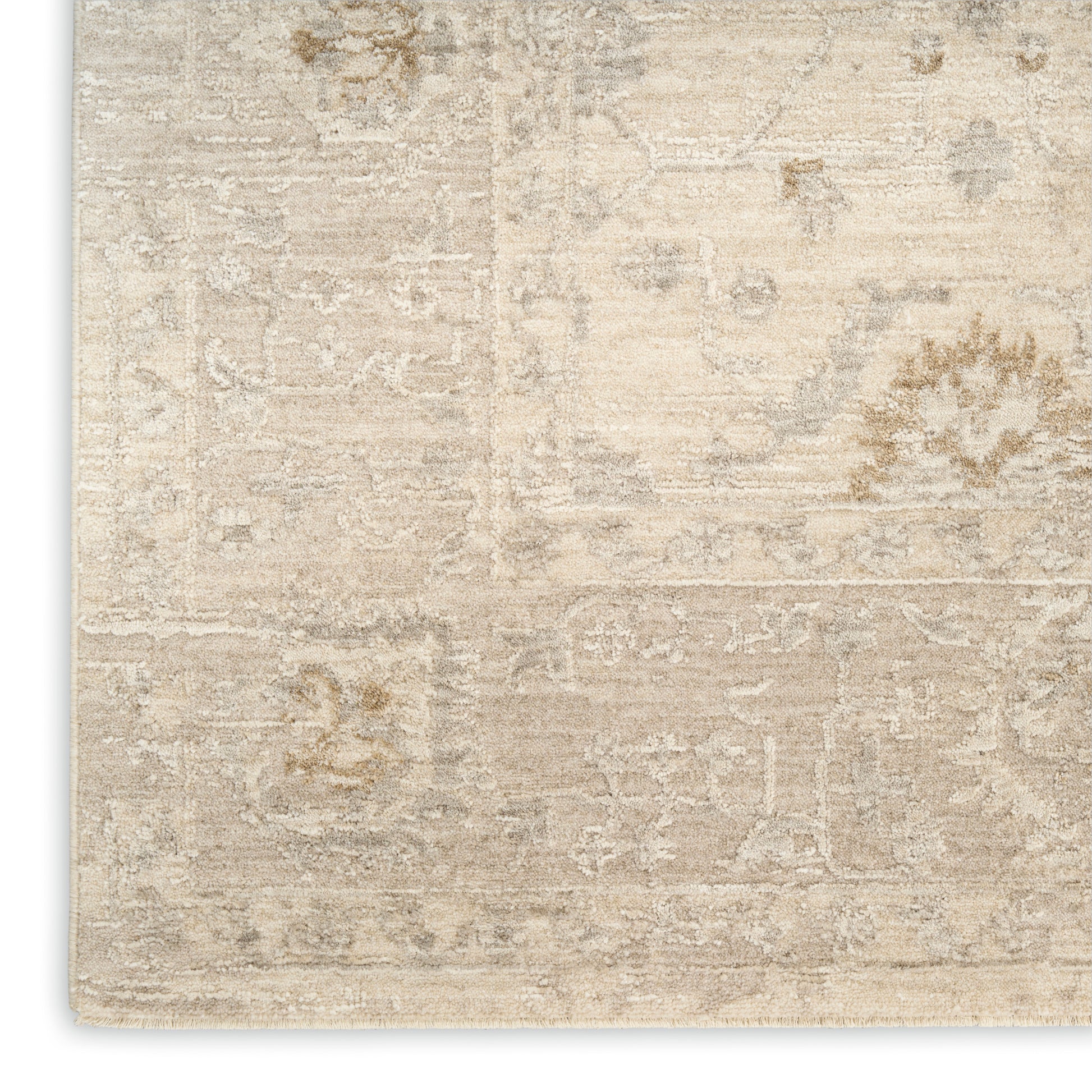 Beige distressed vintage rug with muted cream and taupe floral pattern; rectangular, soft-neutral decor.