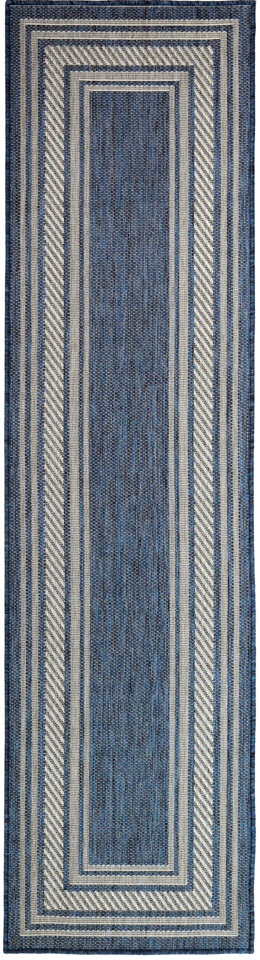 Indigo blue woven runner rug with ivory layered borders and diagonal striped accents.