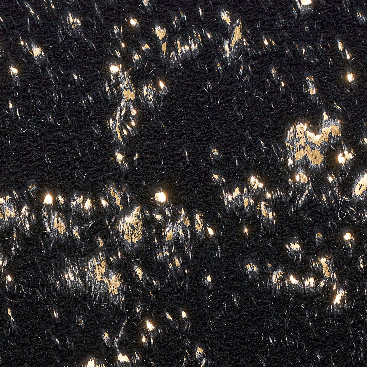 Black boucle with gold metallic flecks; textured tweed-style weave, luxe fabric for jackets, dresses, or accessories.