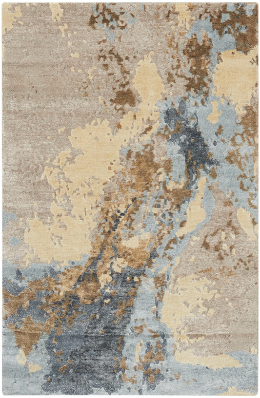 Abstract area rug with beige, taupe, blue and brown blotches; modern, soft texture, rectangular.