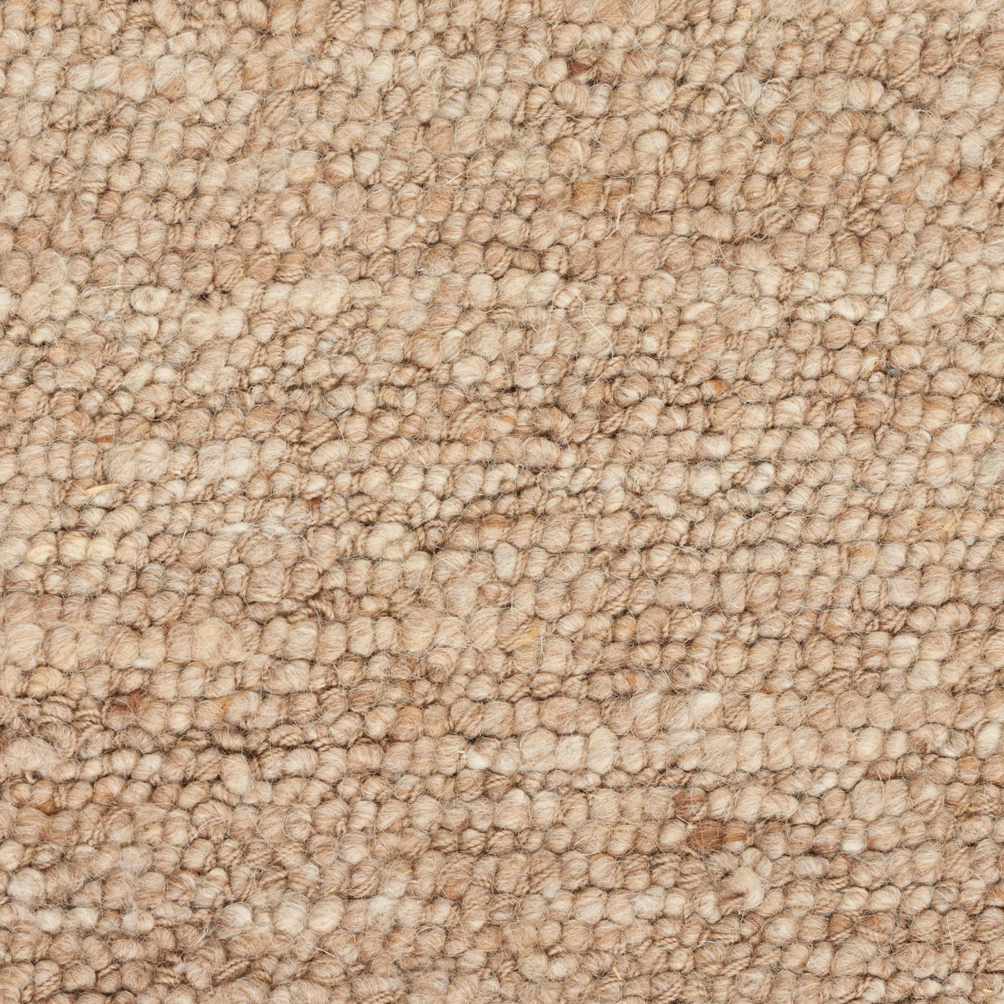 Beige loop-pile carpet close-up with tan and cream flecks for a cozy textured area rug.