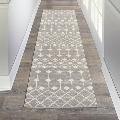 Long gray and ivory geometric hallway runner rug with diamond and lattice pattern.