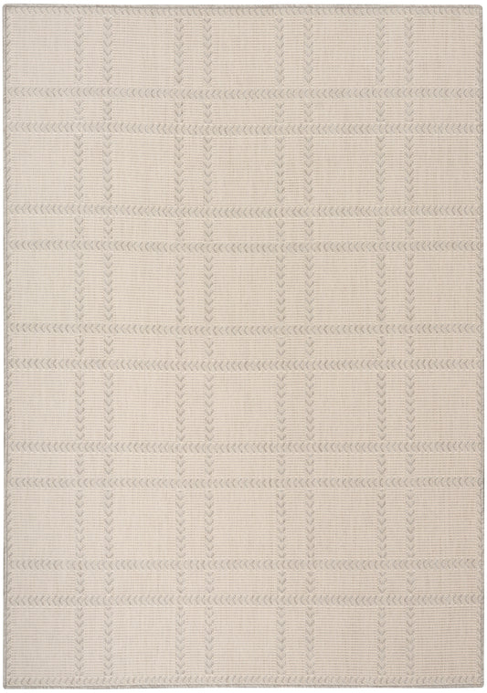 Beige flat-weave area rug with light gray rectangular grid and subtle chevron-border detailing.