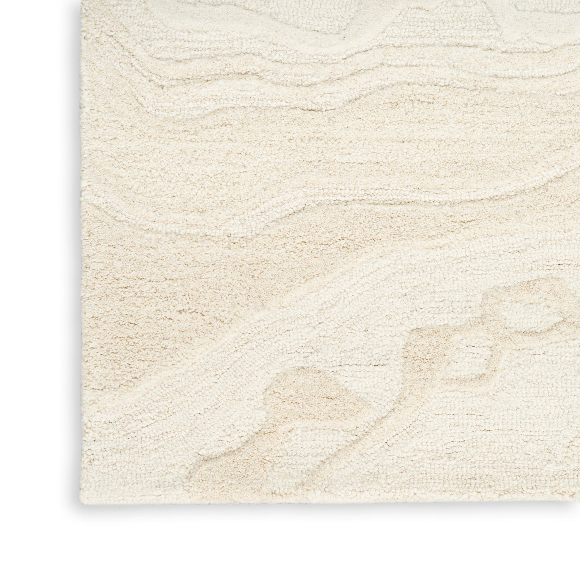 Cream beige textured rug with a subtle wavy embossed pattern in a soft neutral color.