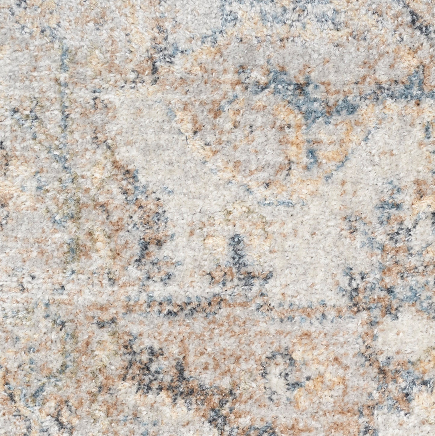 Beige and blue antique-style area rug with plush pile and subtle faded motif.
