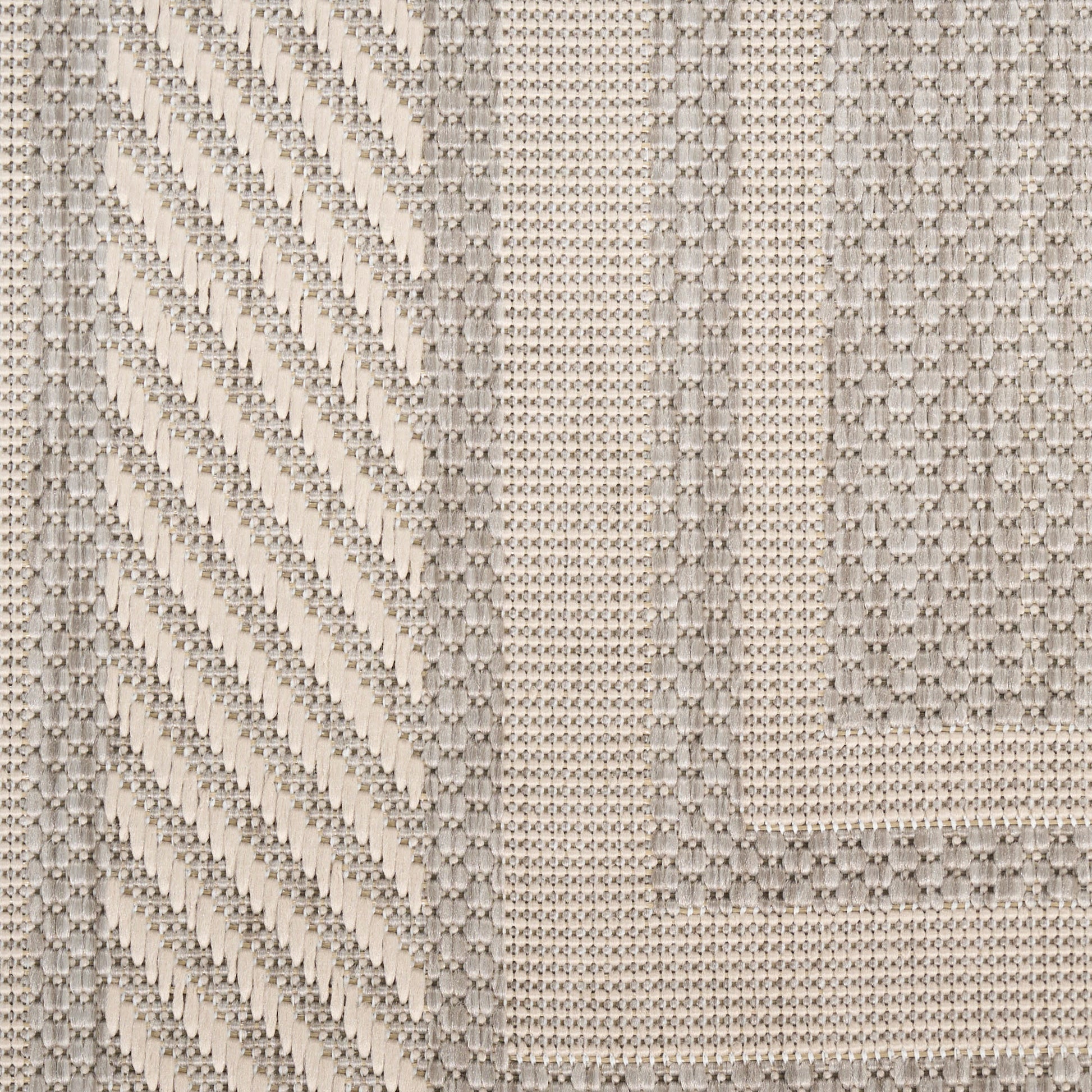 Cream woven fabric with diagonal chevron stripe and dotted grid texture, framed by a geometric border.