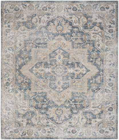 Distressed blue and beige oriental rug with a central medallion and ornate border pattern.