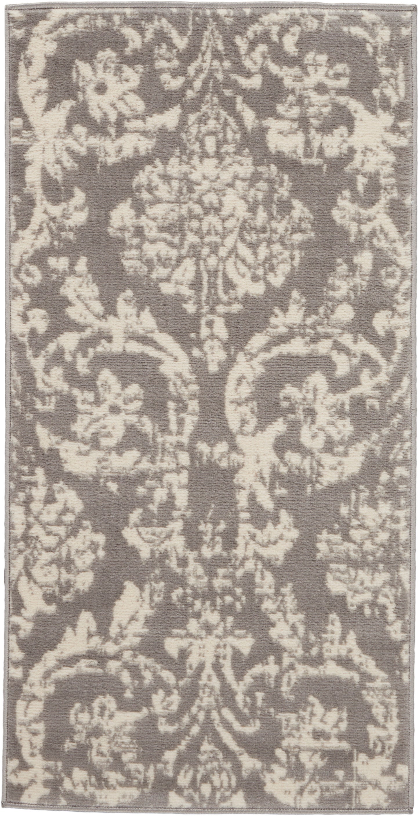 Rectangular rug with taupe background and ivory damask pattern; traditional floral medallion style.