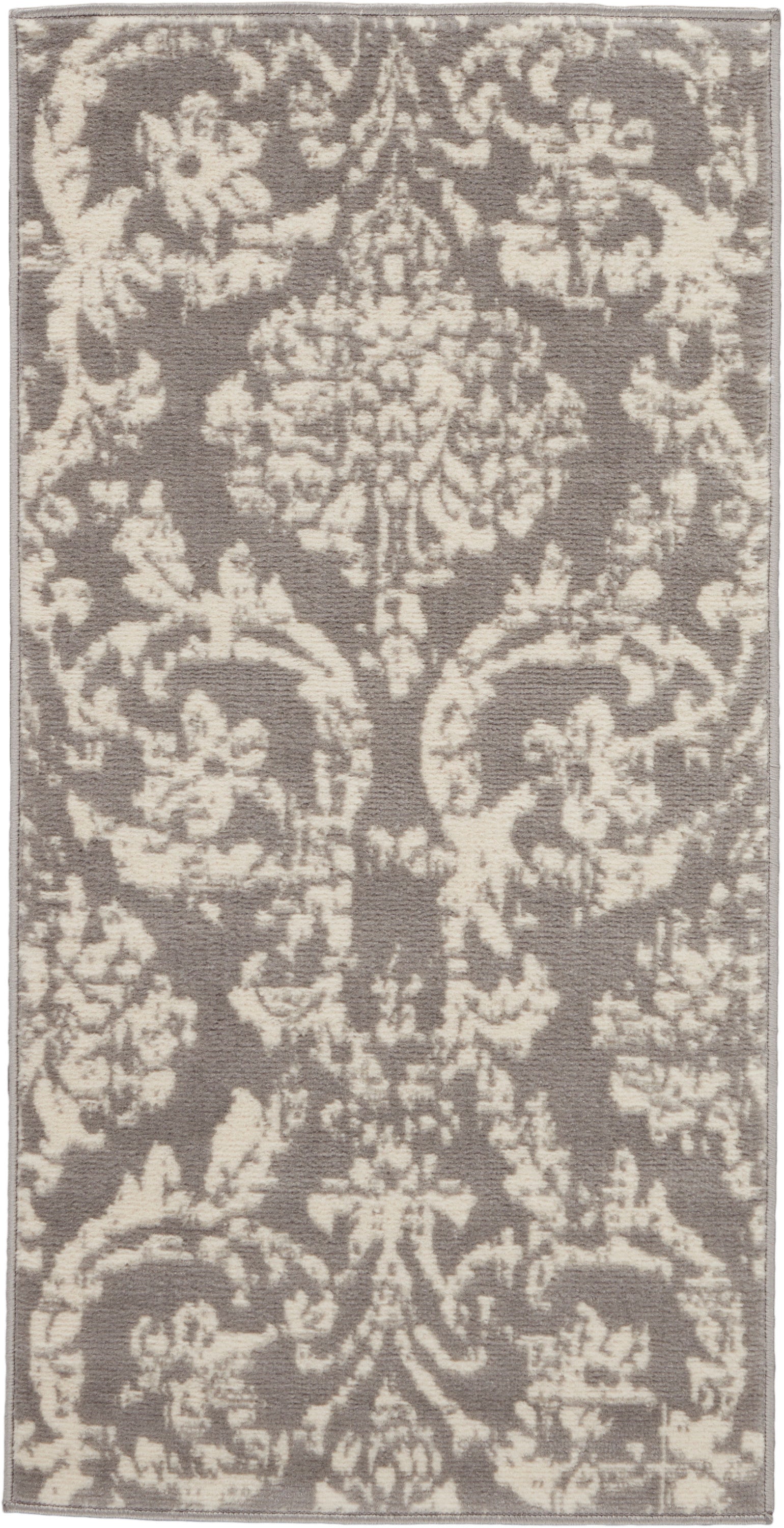 Rectangular rug with taupe background and ivory damask pattern; traditional floral medallion style.