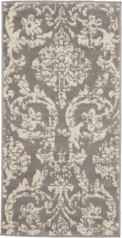 Rectangular rug with taupe background and ivory damask pattern; traditional floral medallion style.