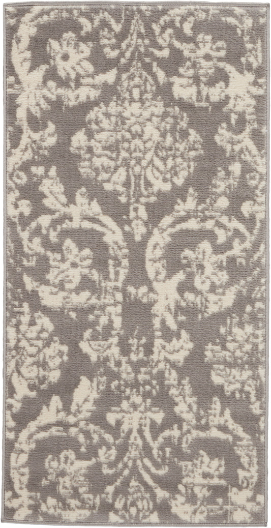 Rectangular rug with taupe background and ivory damask pattern; traditional floral medallion style.