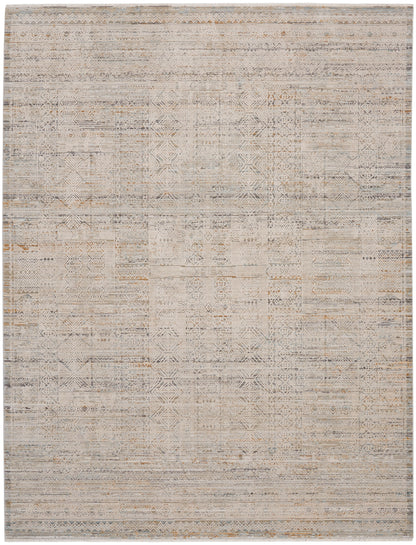 Neutral geometric patchwork rug in beige, taupe, and gray with a distressed weave and subtle diamond motifs.