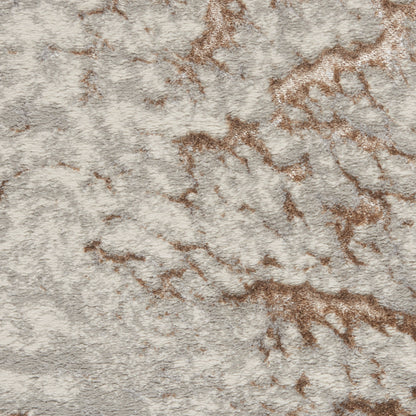 Cream shag rug with brown branching pattern, plush texture for cozy living spaces.
