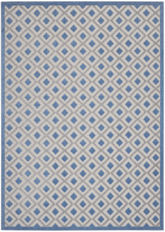 Rectangular woven rug with blue border and repeating blue diamond lattice over a beige field.